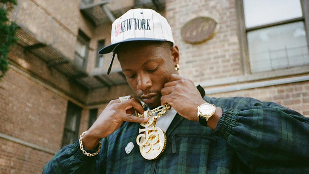 Joey Badass in chain and hat