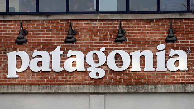 A sign hangs in front of a Patagonia store on October 29, 2021 in Chicago, Illinois