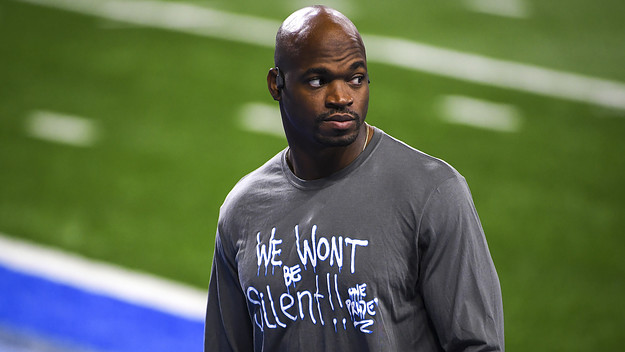 Adrian Peterson #28 of tAdrian Peterson of the Detroit Lions looks on before the game against the Washington Football Team