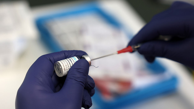 A medical professional prepares a dose of the monkeypox vaccine on July 23, 2022 in London, England
