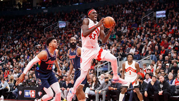 Pascal Siakam #43 of the Toronto Raptors drives to the net against Tobias Harris #12 of the Philadelphia 76ers