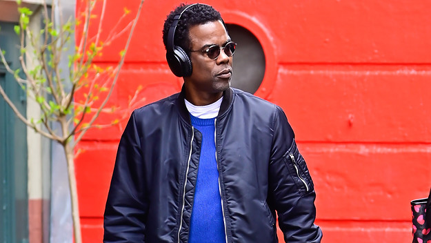 Chris Rock is seen wearing headphones