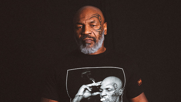 Mike Tyson wearing a shirt of himself smoking
