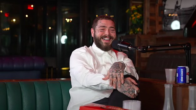 Post Malone is seen ripping a cig and sipping a Bud