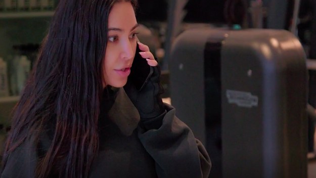 Kim Kardashian is pictured talking on the phone in a dramatic fashion