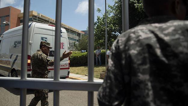 An ambulance arrives at the Dominican Republic environmental headquarters
