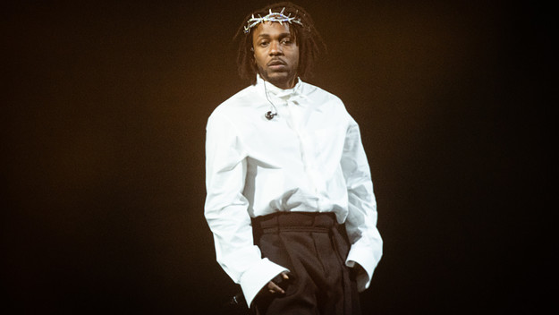 Kendrick Lamar is pictured performing at a festival