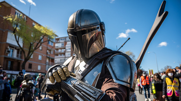 A man dressed as the Mandalorian during a Star Wars Parade.