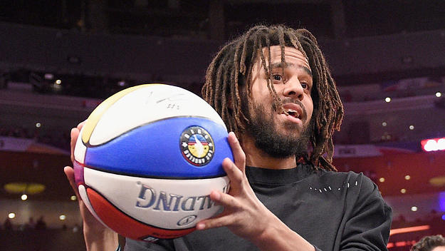 J. Cole attends the 2018 Verizon Slam Dunk Contest at Staples Center on February 17, 2018