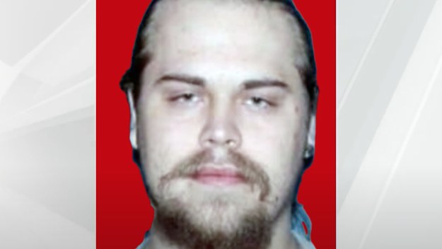 A man is pictured in his mugshot after an arrest