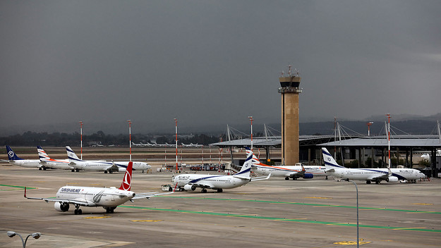This picture taken on December 21, 2021 shows a view of aircraft at Israel's Ben Gurion Airport in Lod, east of Tel Aviv