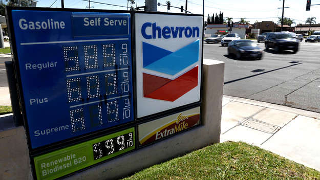 A gas station sign showing high prices is pictured