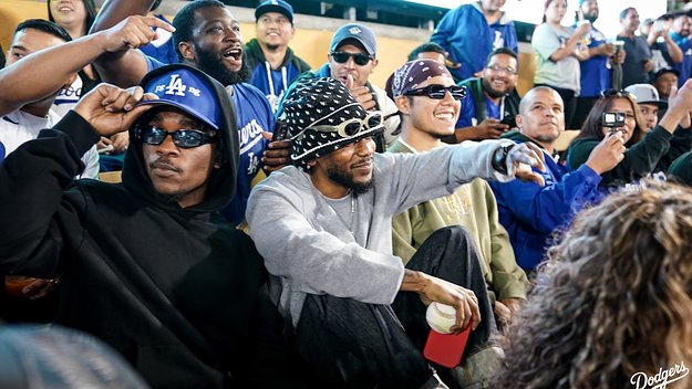 Kendrick Lamar is seen at a baseball game