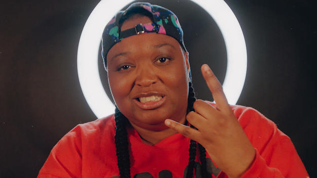 Toronto rapper DijahSB does metal hand sign in front of ring light