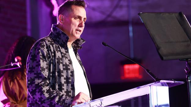Mike Dean accepts the Producer of the Year award from Variety