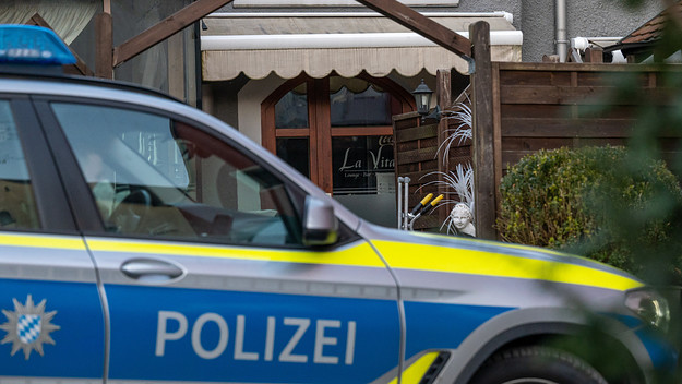 A police vehicle is pictured parked at an eatery