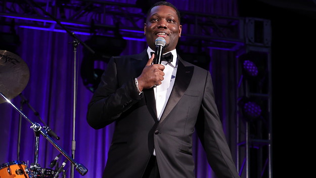 Michael Che speaks onstage at American Museum of Natural History