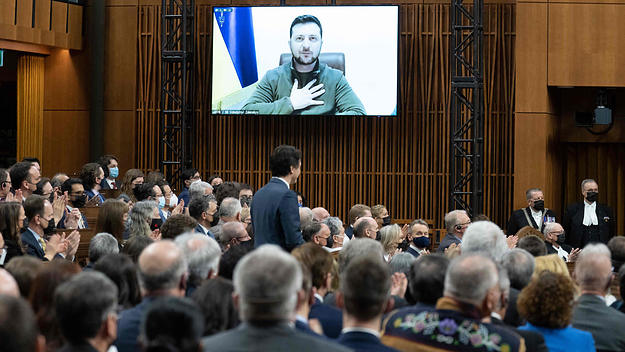 Ukrainian President Volodymyr Zelensky listens to Canadian Prime Minister Justin Trudeau