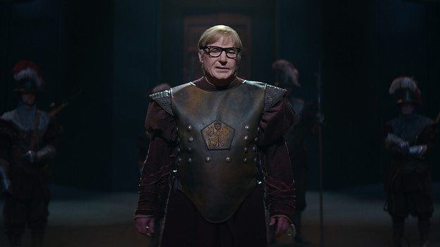 Mike Myers wearing armour in 'The Pentaverate'