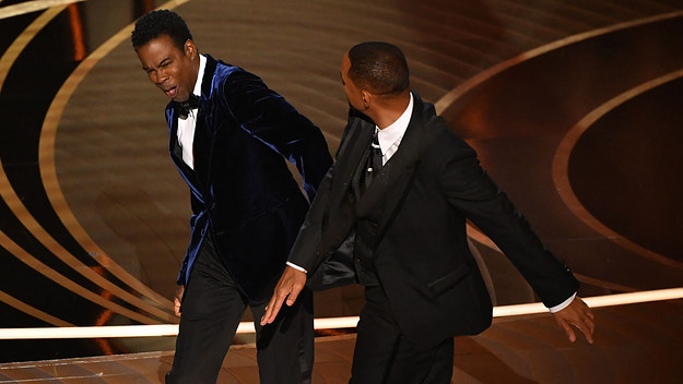 Chris Rock and Will Smith are pictured at the 2022 Oscars
