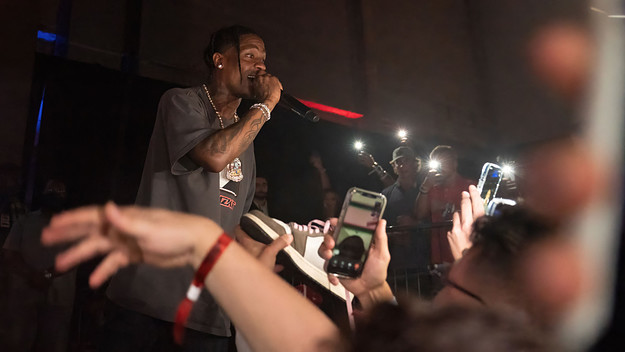 Travis Scott performs live for fans