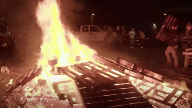 A pastor has people burning things
