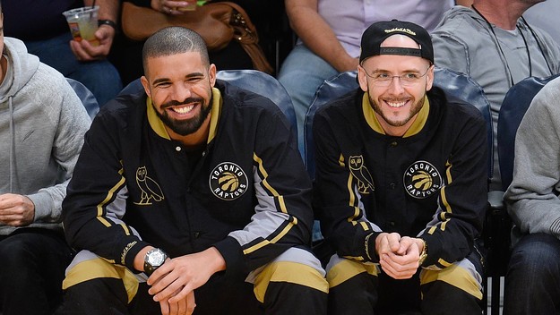 Drake (L) and Noah Shebib attend a basketball game between Raptors and Lakers