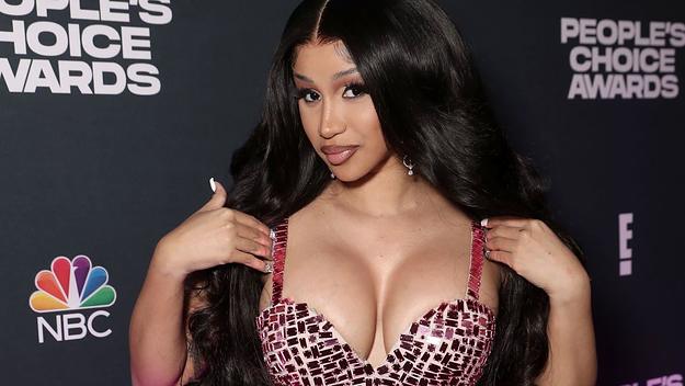 Cardi B poses backstage during the 2021 People's Choice Awards