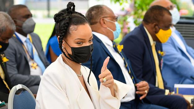 Rihanna Fenty gestures prior to speaking as she is named Barbado's 11th National Hero during the National Honors ceremony.