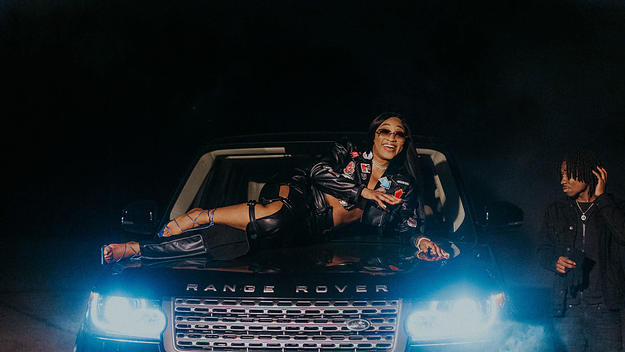 Scarborough rapper Tia Banks poses on Range Rover