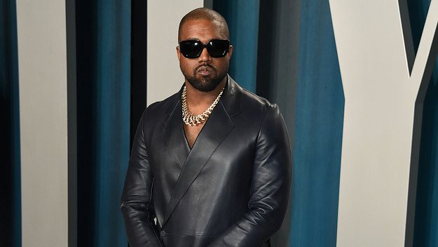 Ye rocks a leather blazer on the red carpet.