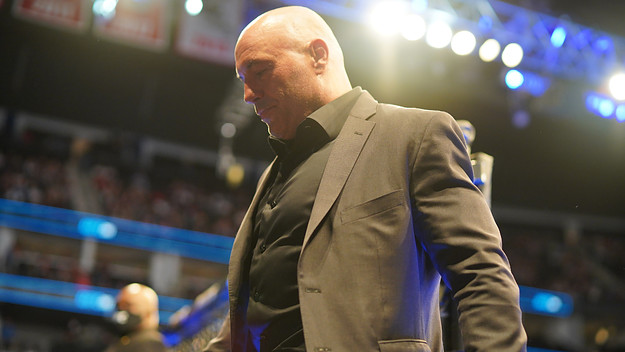 Joe Rogan walks while wearing clothing