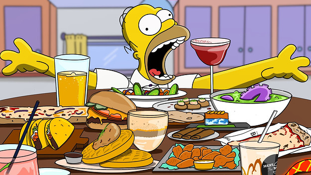 Homer Simpson having a feast with lots of food