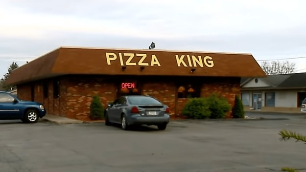 Cars sit outside Pizza King in Connersville, Indiana
