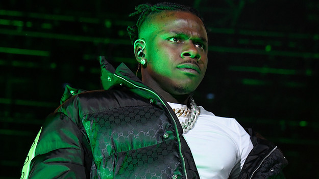 DaBaby appears onstage at a show.