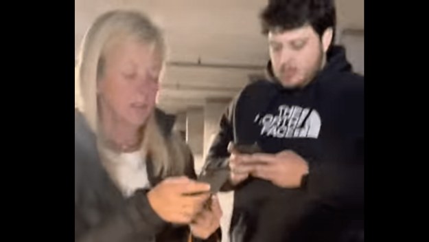 Edward Brennan, who is being charged with assault, standing with his mother