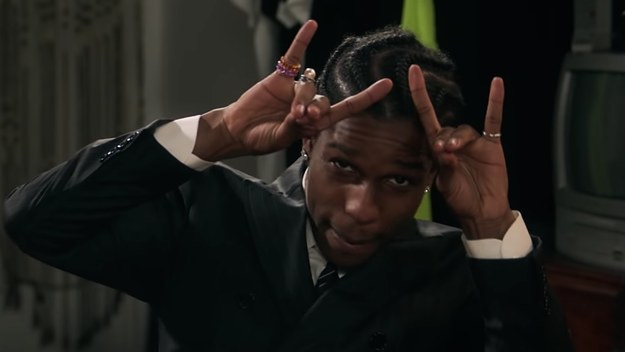 ASAP Rocky gives the horns.