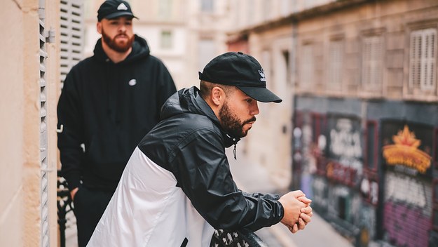 D-track and Nicholas Craven hangout in promotional photo.