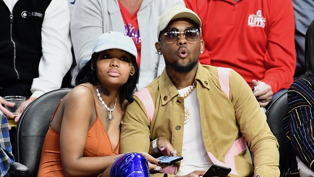 Musician Summer Walker and producer London On Da Track attend a basketball game