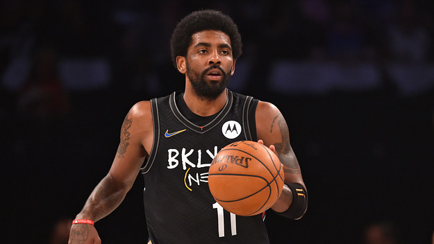 Kyrie Irving #11 of the Brooklyn Nets handles the ball against the Milwaukee Bucks