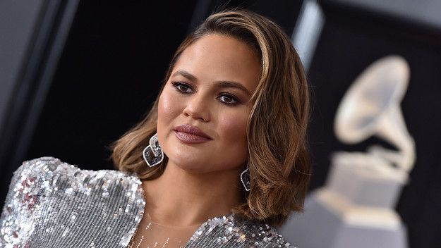 Chrissy Teigen photographed attending Grammy Awards.