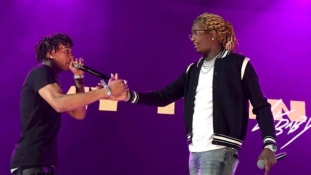 Young Thug and Lil Baby on stage.