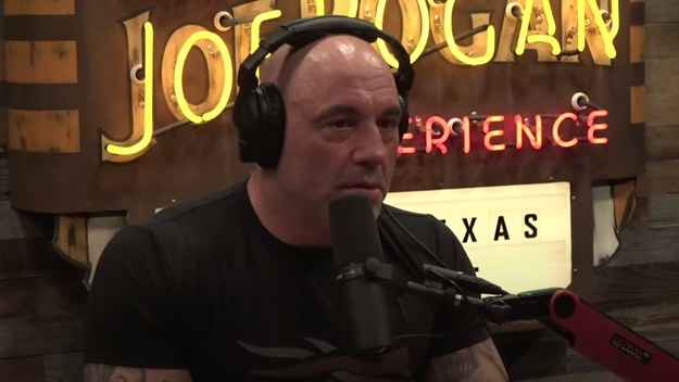 Joe Rogan speaks into a microphone.