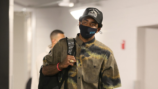 Kyrie Irving #11 of the Brooklyn Nets arrives to the arena prior to the game against the Milwaukee Bucks.