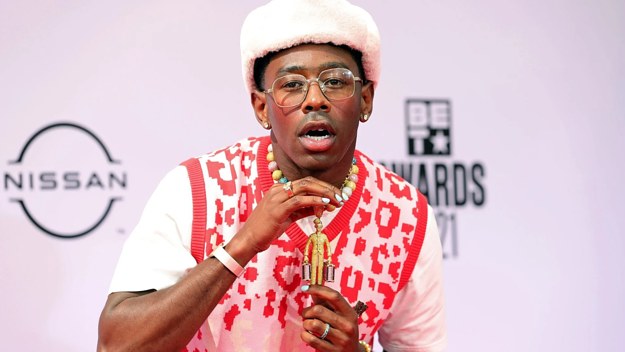 Tyler The Creator Holding Up Chain