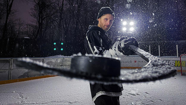 Mark Blinch poses with hockey stick