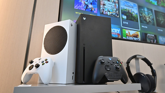 Microsoft's Xbox Series X (black) and series S (white) gaming consoles