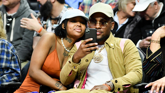 Summer Walker and London On Da Track attend a basketball game between the Clippers and 76ers.