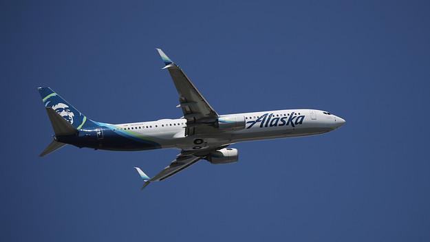 A Boeing 737 990 (ER) operated by Alaska Airlines