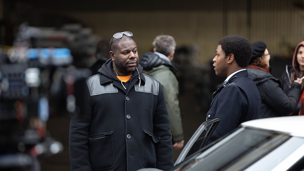 Director Steve McQueen and John Boyega as Leroy Logan on the set of Red, White and Blue.